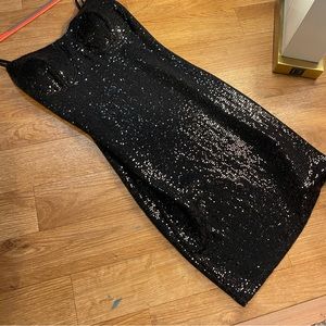 Bodycon sparkly black mini dress